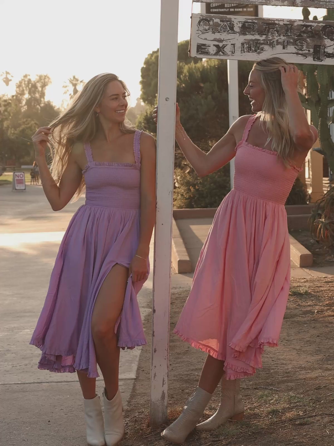 Pink boho midi dress with smocked bodice, elastic straps, side slit, ruffled hem and pockets